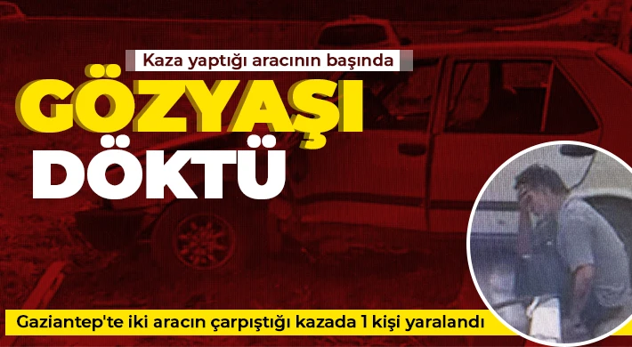 Kaza yaptığı aracının başında gözyaşı döktü