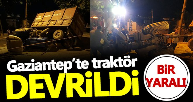 Devrilen traktörün altında kalan sürücüsü yaralandı