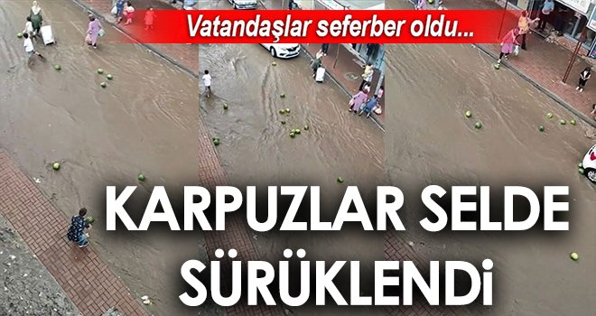 Selde sürüklenen karpuzları vatandaşlar kurtarmaya çalıştı