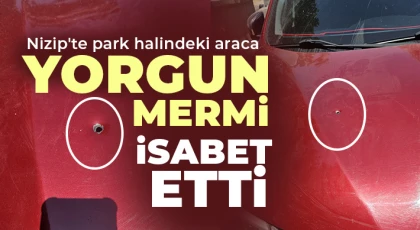 Nizip'te park halindeki araca yorgun mermi isabet etti