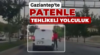Araca tutunarak ilerleyen patenli gencin tehlikeli yolculuğu kameraya yansıdı