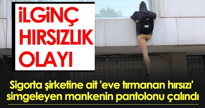 Sigorta şirketine ait 'eve tırmanan hırsızı' simgeleyen mankenin pantolonu çalındı